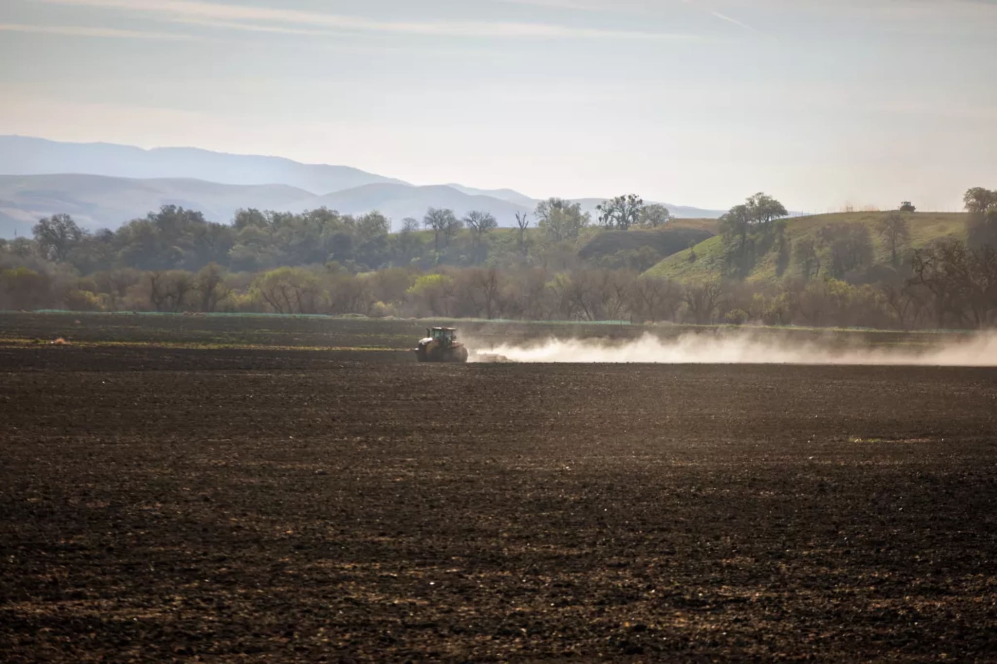 A tractor plows a field in Paso Robles. Cases of valley fever, caused by breathing in dust that contains a fungus, are highest in the Central Coast and Central Valley regions of California. (Jason Armond / Los Angeles Times)